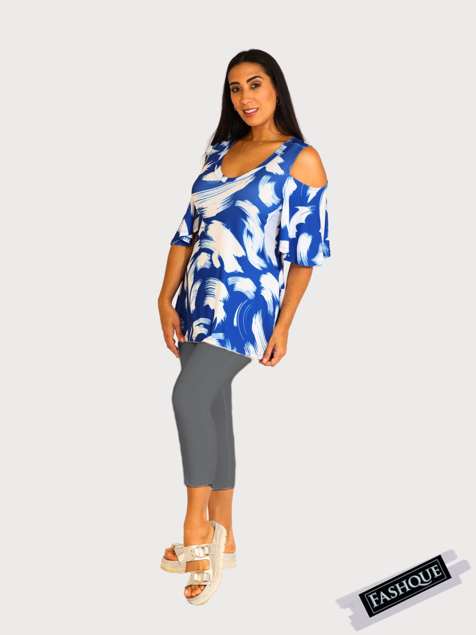 Capri Length Legging. Three button trim at the leg opening enhances the look - P001