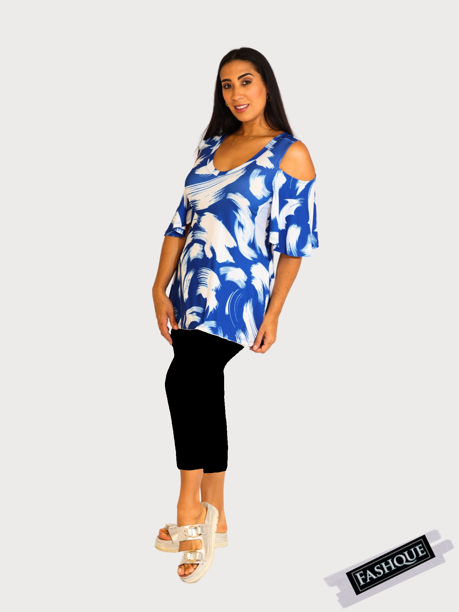 Capri Length Legging. Three button trim at the leg opening enhances the look - P001