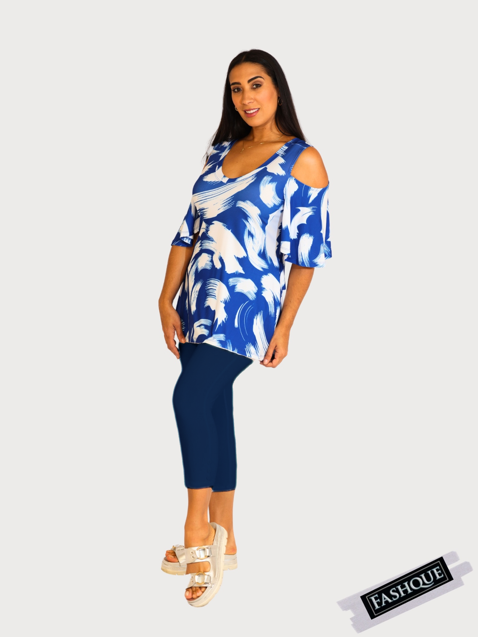 Capri Length Legging. Three button trim at the leg opening enhances the look - P001