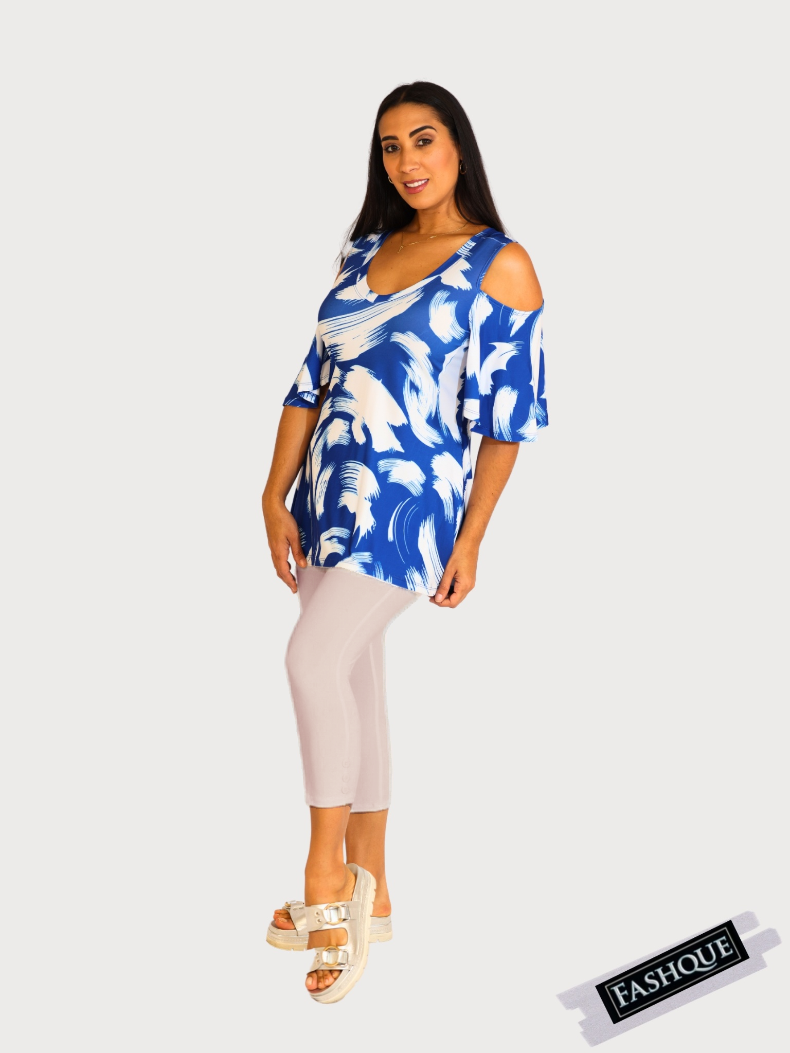 Capri Length Legging. Three button trim at the leg opening enhances the look - P001
